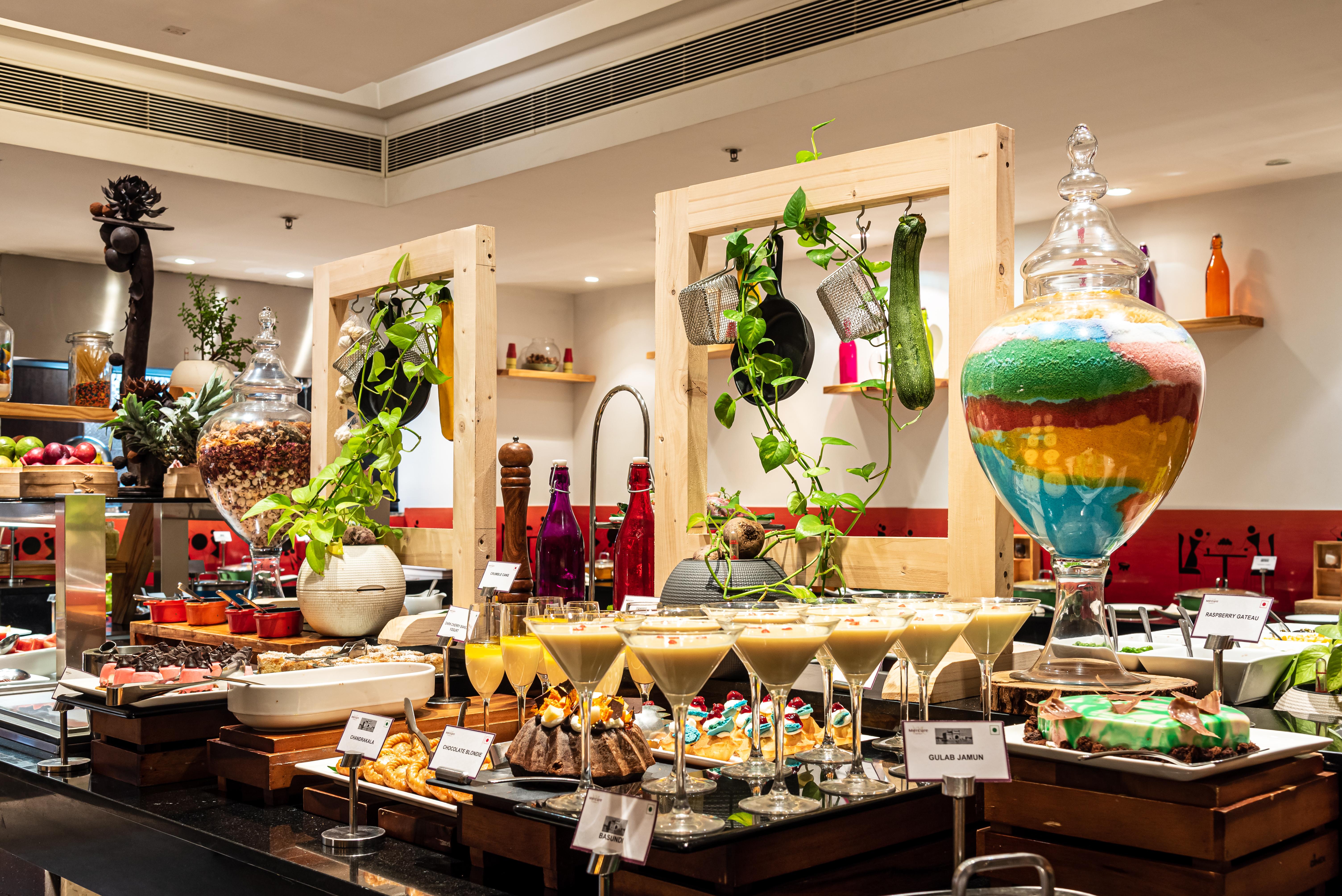 Mercure Hyderabad Kcp Banjara Hills, An Accor Hotel Buitenkant foto A dessert buffet at a hotel in India